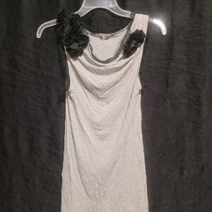 Charlotte Russe Cream Sleeveless Blouse with Black Floral Accents